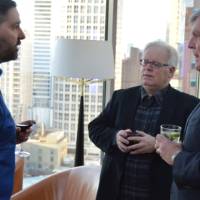 T.Haas talks with two alumni
